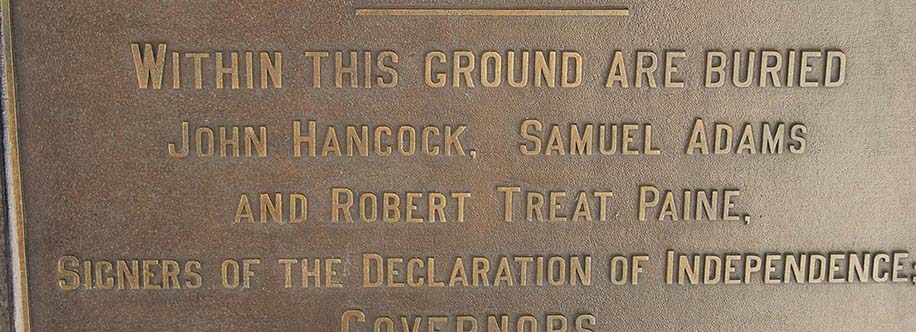 marks the burial places of John Hancock, Samuel Adams and Robert Treat Paine.