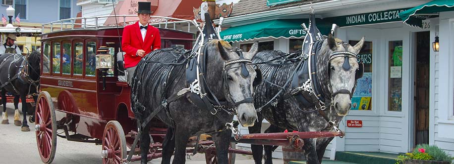 Luxury coach drawn by horses on Mackinac Island, Lake Huron, Michigan
