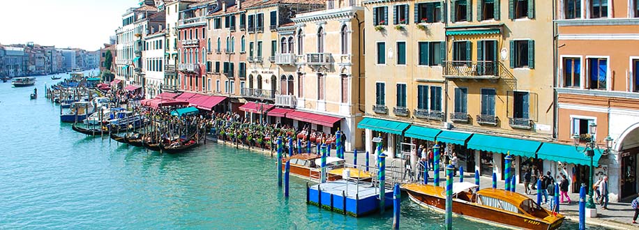 boats and homes along canal